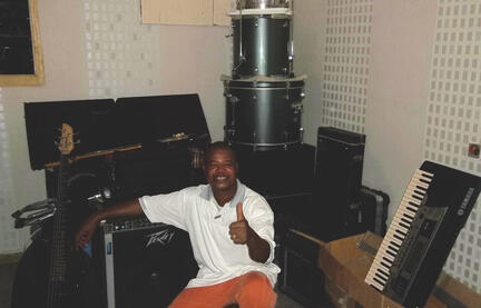 Narcisse with gear donated and shipped from Washington, DC